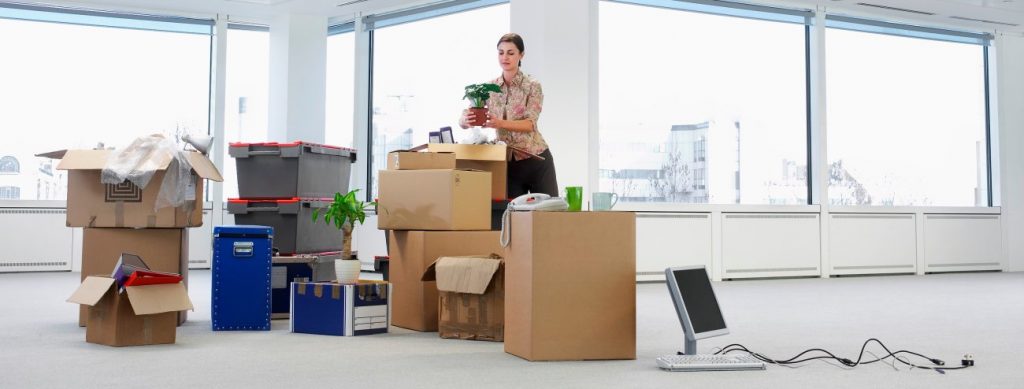 Image Showing A Young Woman Working In Relocation Services.